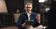 © Flashizzle24/peopleimages.com - Mature man, discussion or online interview with tablet for tutorial or development process. Male person, influencer or presentation with recording for creative documentary, help tips or night lesson