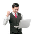 © suphaporn - Excited businessman in a suit and red tie holding a laptop with a triumphant expression, celebrating success in business or online achievement, isolated on a transparent background