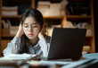 © Imaging L - A young professional woman feeling burnout