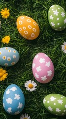Wall Mural - colorful easter eggs lying on green grass with flowers