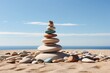 © Arif - A collection of uniquely shaped, multi-colored stones balanced on a smooth,