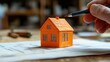 © Egriva - Architect designing house, blueprint, workshop