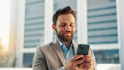 Fototapete - Business, cellphone and man in city, internet and connection with social media, travel and communication. Person, accountant or financial advisor with tech, trading results or digital app in New York