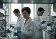 © SRD - Dedicated Scientists Conducting Experiments in a Modern Laboratory Setting