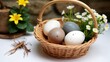 © Bruno Adachi - A basket filled with three eggs sitting on top of a white table.