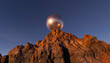 © ADDICTIVE STOCK - Silver sphere on a mountain top under a clear sky