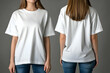 © Fazal - An oversized white t-shirt mockup worn by a woman, styled with jeans, creating a relaxed, modern look for apparel design. 40k, , high resolution