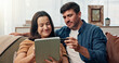 © peopleimages.com - Couple, credit card and tablet for online shopping on sofa, home and smile with search for deal in lounge. Man, woman and happy for discount, sale and easy payment with app, touchscreen and ecommerce