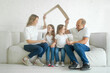 © millaf (Nemchinova) - Smiling family at home. Housing, relocation, real estate and insurance concept