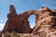 © Wirestock - Turret Arch in Arches National Park under a clear sky.