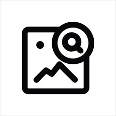 Wall Mural - a magnifying glass over an image for search functionality.