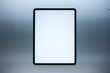 © Hassan - A Sleek and Modern Tablet Computer Displayed Against a Muted Background