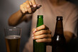 © urzine - Hands Opening Beer Bottle On The Room