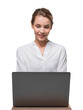 © ImageFlow - Smiling woman in white blouse working on laptop, sitting at desk, isolated on white background. Business, technology, and remote work concept
