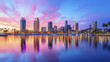 © Tee nuT - Stunning sunset over San Diego skyline reflecting in water, showcasing vibrant colors and city lights