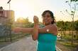 © Fabián Montaño - Young Athletic latin Woman with glucose monitor doing exercise