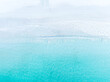 © biletskiyevgeniy.com - Drone view of white sand beach and azure sea. Water on the sea coast. Summer vacation and holiday. Transparent sea water and waves. Photography for background, postcards, wallpapers.