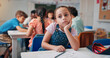 © peopleimages.com - Bored, thinking and student with girl in classroom for education, learning disorder and future. Problem solving, mental health and reflection with child with adhd in school for studying and idea