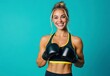 © UnderTheSun - Smiling woman in boxing gloves against a bright background, embodying strength and confidence.