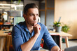 © Wavebreak Media - Businessman in blue shirt thinking deeply at modern office workspace
