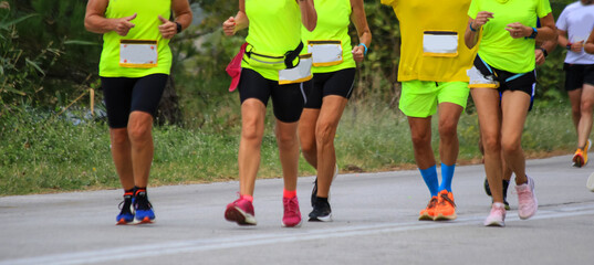 runners running in a race team excitemetn trying endurance