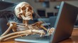 © Nataliia_Trushchenko - Skeleton is sitting at a computer and using a laptop. The skeleton is wearing a spider web and he is typing on the laptop. The scene is eerie and unsettling