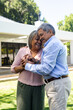 © Wavebreak Media - Senior diverse senior couple dancing happily in garden, enjoying sunny day together
