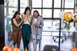 © Wavebreak Media - Female diverse colleagues celebrating surprise party in modern office with balloons and laughter