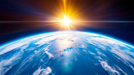 Wall Mural - A breathtaking sunrise emerges over the Earth, illuminating its surface with golden light. The vibrant blue oceans and white clouds create a stunning visual against the dark backdrop of space