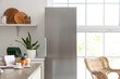 © Pixel-Shot - Stylish fridge in interior of kitchen