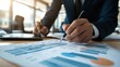 © arsya - Businessman Analyzing Financial Data