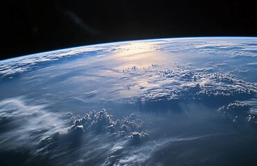 Wall Mural - Stunning view of earth from space with clouds over ocean showcasing breathtaking global panorama