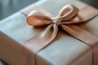 © ALPADESIGN - A beautifully wrapped gift box is tied with a delicate ribbon