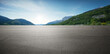 © Image Craft - Panoramic empty asphalt road and green mountain natural scenery background under the blue sky.
