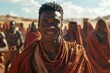 © Deep Stock - Smiling African Man in Red Robe with Beaded Necklace in Desert Landscape