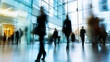 © 자인 김 - a blurred photograph of business people walking in an office building with