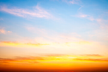 Wall Mural - beautiful , luxury soft gradient orange gold clouds and sunlight on the blue sky perfect for the bac