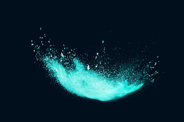 Wall Mural - green powder explosion on black background. colored cloud. colorful dust explode. paint holi