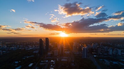 Poster - Stunning aerial view of a city skyline during sunset with vibrant colors and dramatic clouds in the sky : Generative AI
