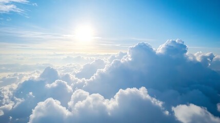 Wall Mural - aerial view of fluffy white clouds illuminated by bright sunlight in a clear blue sky : generative a
