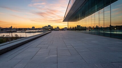 Poster - Stunning modern building with reflective glass facade overlooking a vibrant skyline at sunset : Generative AI