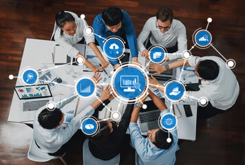 Leinwandbilder - A dynamic group of professionals engaged in a collaborative meeting focused on data analysis, featuring digital icons that symbolize growth and technology in a modern workspace. Amity