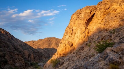 Aufkleber - Majestic desert landscape with rocky formations illuminated by warm sunset light and vivid skies : Generative AI