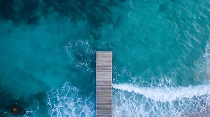 Aufkleber - Aerial view of a wooden pier extending into turquoise ocean waves at beach : Generative AI