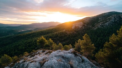 Aufkleber - Sunset illuminating a mountainous landscape with lush greenery and rocky hills : Generative AI