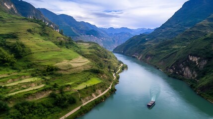 Poster - Aerial view of a serene river flowing through green hills and mountains under a dramatic cloudy sky : Generative AI