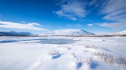Aufkleber - Stunning winter landscape with snow covered mountains under bright blue sky and fluffy clouds : Generative AI