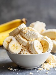 Poster - Delicious freshly sliced bananas piled in a bowl showcasing natural sweetness and creamy texture : Generative AI