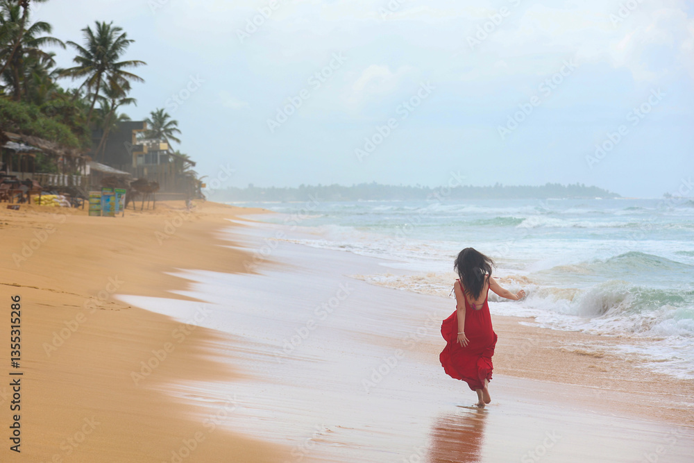red dress lady beach running Girl in long on the in the morning. Soft focus Stock Photo program:Prefall