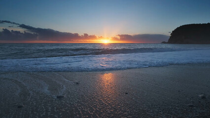 Wall Mural - sunset over sea with vibrant colors